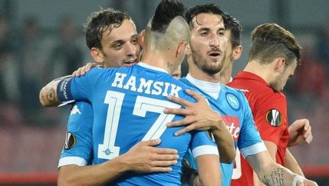 Napoli's Manolo Gabbiadini exults with teammates after scoring the goal of 3-0, his second in this match, during the Uefa Europa League soccer match SSC Napoli vs Midtjylland at San Paolo stadium in Naples, Italy, 05 November 2015. ANSA/ CIRO FUSCO