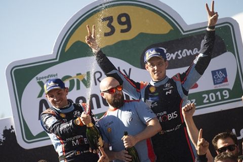 Thierry Neuville (BEL) Nicolas Gilsoul (BEL) of team Hyundai Shell Mobis WRT celebrate on the podium in first place after winning the World Rally Championship Argentina in Villa Carlos Paz, Argentina on April 28 2019, // Jaanus Ree/Red Bull Content Pool // AP-1Z62QN7412511 // Usage for editorial use only // Please go to www.redbullcontentpool.com for further information. // 