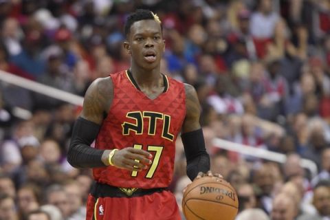 Atlanta Hawks guard Dennis Schroder, of Germany, dribbles during the second half in Game 5 of a first-round NBA basketball playoff series against the Washington Wizards, Wednesday, April 26, 2017, in Washington. The Wizards won 103-99. (AP Photo/Nick Wass)