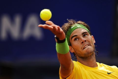 BARCELONA, SPAIN - APRIL 24:  Rafael Nadal of Spain serves to David Ferrer during the final match on day seven of the ATP 500 World Tour Barcelona Open Banco Sabadell 2011 tennis tournament at the Real Club de Tenis on April 24, 2011 in Barcelona, Spain. Nadal won the match in two sets , 6-2, 6-4.  (Photo by David Ramos/Getty Images)