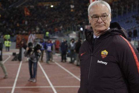 New Roma coach Claudio Ranieri enters the field prior to an Italian Serie A soccer match between Roma and Empoli, at the Olympic stadium in Rome, Monday, March 11, 2019. (AP Photo/Gregorio Borgia)