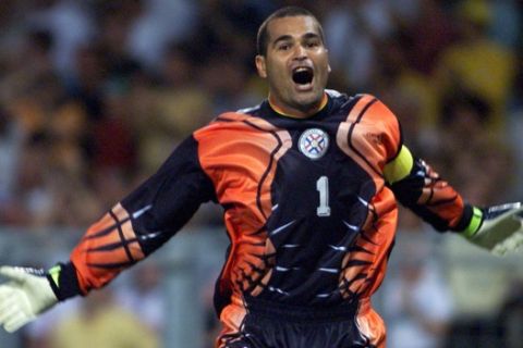 Paraguay's goalkeeper Jose Luis Chilavert jubilates after the third goal of his team against Nigeria  during the Nigeria v Paraguay, Group D, World Cup 98, soccer match at the Stadium Municipal in Toulouse on Wednesday, June 24, 1998. The other teams in Group D are Spain and Bulgaria. Paraguay won 3-1.  (AP Photo/Ricardo Mazalan)