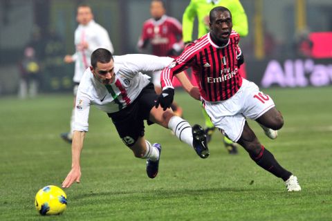 Juventus' defender Leonardo Bonucci (L) fights for the ball with AC Milan's Dutch midfielder Clarence Seedorf during their Tim Cup semifinal football match between AC  Milan vs Juventus at San Siro Stadium in Milan on February 8, 2012. AFP PHOTO / GIUSEPPE CACACE (Photo credit should read GIUSEPPE CACACE/AFP/Getty Images)