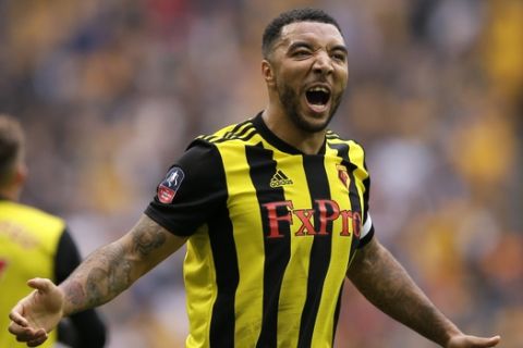 Watford's Troy Deeney celebrates after scoring his side's second goal during the English FA Cup semifinal soccer match between Watford and Wolverhampton Wanderers at Wembley Stadium in London, Sunday, April 7, 2019. (AP Photo/Tim Ireland)