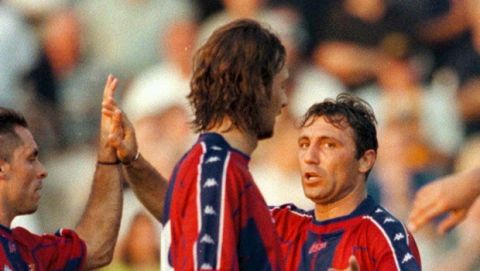 FC Barcelona player Christophe Dugarry (front no 9) and Hristo Stoichkov, 2nd from right, with unidentified teammates as they celebrate their 0-3 victory Friday July 25, 1997 in their friendly training game against Swedish team Elfsborg. (AP Photo/Cicci Johansson)