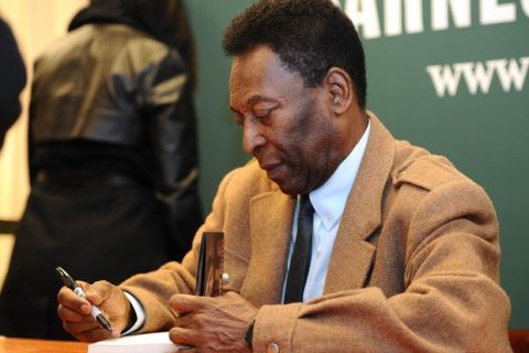 NEW YORK, NY - APRIL 01: Pele signs a copy of his book "Why Soccer Matters" at Barnes & Noble, 5th Avenue on April 1, 2014 in New York City.  (Photo by Maddie Meyer/Getty Images)