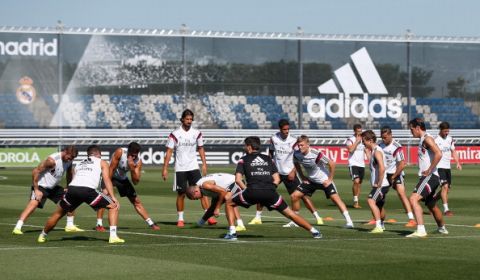 MADRID, SPAIN - AUGUST 07: Real Madrid players stretch during a training session at Valdebebas training ground on August 7, 2014 in Madrid, Spain. (Photo by Antonio Villalba/Real Madrid via Getty Images)