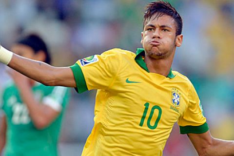 Brazil's forward Neymar celebrates after scoring against Mexico during their FIFA Confederations Cup Brazil 2013 Group A football match, at the Castelao Stadium in Fortaleza, on June 19, 2013.  AFP PHOTO / YURI CORTEZ        (Photo credit should read YURI CORTEZ/AFP/Getty Images)
