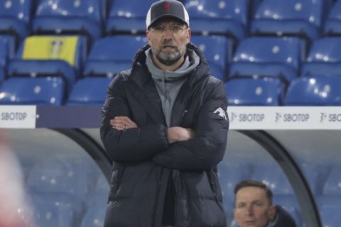 Liverpool's manager Jurgen Klopp reacts during the English Premier League soccer match between Leeds United and Liverpool at the Elland Road stadium in Leeds, England, Monday, April 19, 2021. (Clive Brunskill/Pool via AP)
