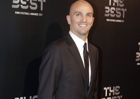 Argentina former footballer Esteban Cambiasso arrives for the The Best FIFA 2017 Awards at the Palladium Theatre in London, Monday, Oct. 23, 2017. (AP Photo/Alastair Grant)