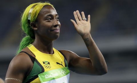 Jamaica's Shelly-Ann Fraser-Pryce waves after winning a women's 100-meter heat during the athletics competitions of the 2016 Summer Olympics at the Olympic stadium in Rio de Janeiro, Brazil, Friday, Aug. 12, 2016. (AP Photo/David J. Phillip)