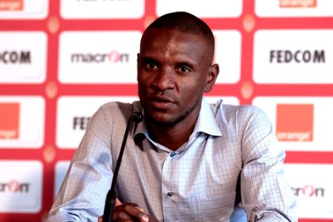 Soccer player Eric Abidal  is seen during his official presentation after signing for AS Monaco, Monday, July 8, 2013, in Monaco. (AP Photo/Lionel Cironneau)