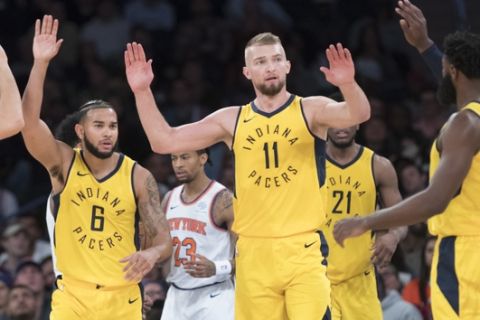 Indiana Pacers forward Domantas Sabonis (11) celebrates with his teammates after scoring during the second half of an NBA basketball game against the New York Knicks, Wednesday, Oct. 31, 2018, at Madison Square Garden in New York. The Pacers won 107-101. (AP Photo/Mary Altaffer)
