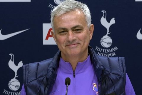 Image taken from PA Video showing newly appointed Tottenham Hotspur manager Jose Mourinho during a press conference at Tottenham Hotspur Training Centre, in London, Thursday Nov. 21, 2019.  Mourinho is back in the English Premier League management by joining Tottenham. (PA Video/PA via AP)