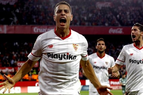 Sevilla's Ben Yedder, celebrates after scoring against Real Madrid during La Liga soccer match between Sevilla and Real Madrid at the Sanchez Pizjuan stadium, in Seville, Spain on Wednesday, May. 9, 2018. (AP Photo/Miguel Morenatti)