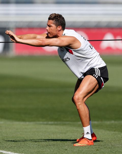 MADRID, SPAIN - AUGUST 07: Cristiano Ronaldo of Real Madrid exercises during a training session at Valdebebas training ground on August 7, 2014 in Madrid, Spain. (Photo by Antonio Villalba/Real Madrid via Getty Images)