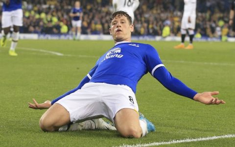 Everton's Ross Barkley celebrates scoring his side's first goal of the game against Watford during the English Premier League soccer match at Goodison Park in Liverpool, England, Friday May 12, 2017.  (Peter Byrne/PA via AP)