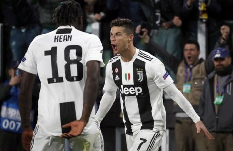Juventus' Cristiano Ronaldo celebrates after scoring his side's third goal during the Champions League round of 16, 2nd leg, soccer match between Juventus and Atletico Madrid at the Allianz stadium in Turin, Italy, Tuesday, March 12, 2019. (AP Photo/Antonio Calanni)