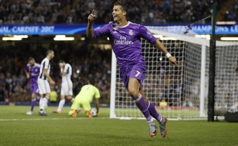 Real Madrid's Cristiano Ronaldo celebrates after scoring during the Champions League final soccer match between Juventus and Real Madrid at the Millennium Stadium in Cardiff, Wales, Saturday June 3, 2017. (AP Photo/Kirsty Wigglesworth)