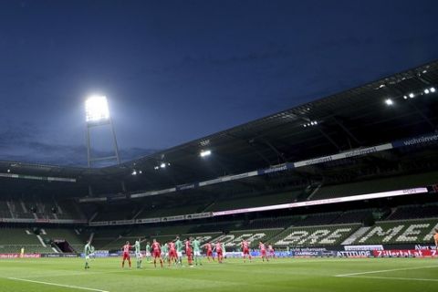 Overview during the German Bundesliga soccer match between Werder Bremen and Bayer Leverkusen 04 in Bremen, Germany, Monday, May 18, 2020. The German Bundesliga becomes the world's first major soccer league to resume after a two-month suspension because of the coronavirus pandemic. (AP Photo/Stuart Franklin, Pool)