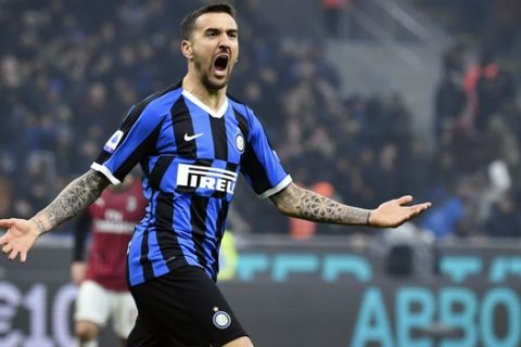 Inter Milan's Matias Vecino celebrates after scoring his side's second goal during the Serie A soccer match between Inter Milan and AC Milan at the San Siro Stadium, in Milan, Italy, Sunday, Feb. 9, 2020. (Massimo Paolone/Lapresse via AP)