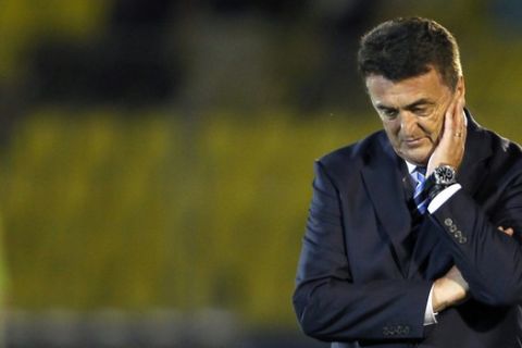 FILE - In this Aug. 11, 2010 file photo, Serbia's coach Radomir Antic reacts after their international friendly soccer match against Greece, in Belgrade, Serbia. Antic will remain the Serbia coach despite poor World Cup results, a major pay cut and a FIFA suspension. (AP Photo/Darko Vojinovic, File)
