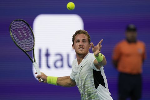 Roberto Carballes Baena, of Spain, returns a shot from Daniil Medvedev, of Russia, during the Miami Open tennis tournament, Saturday, March 25, 2023, in Miami Gardens, Fla. (AP Photo/Wilfredo Lee)