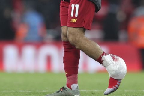 Liverpool's Mohamed Salah applauds at the end of the English Premier League soccer match between Liverpool and Manchester City at Anfield stadium in Liverpool, England, Sunday, Nov. 10, 2019. Liverpool won 3-1. (AP Photo/Jon Super)