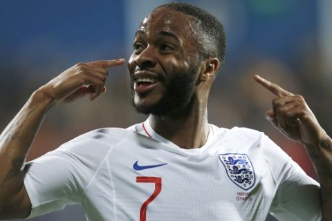 England's Raheem Sterling celebrates scoring his side's fifth goal during the Euro 2020 group A qualifying soccer match between Montenegro and England at the City Stadium in Podgorica, Montenegro, Monday, March 25, 2019. (AP Photo/Darko Vojinovic)