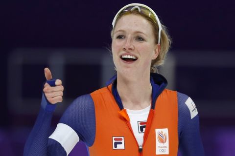 Carlijn Achtereekte of The Netherlands celebrates after the women's 3,000 meters race at the Gangneung Oval at the 2018 Winter Olympics in Gangneung, South Korea, Saturday, Feb. 10, 2018. (AP Photo/John Locher)