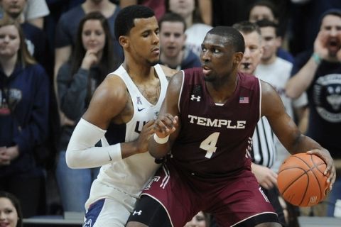 Connecticut's Vance Jackson, left, guards Temple's Daniel Dingle, right, in the second half of an NCAA college basketball game, Wednesday, Jan. 11, 2017, in Storrs, Conn. (AP Photo/Jessica Hill)