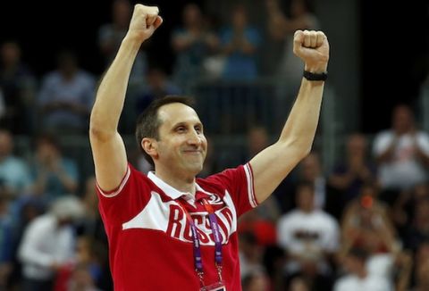 Russia's head coach David Blatt celebrates victory against Brazil after the men's preliminary round Group B basketball match at the Basketball Arena during the London 2012 Olympic Games August 2, 2012.                                 REUTERS/Sergio Perez (BRITAIN  - Tags: OLYMPICS SPORT BASKETBALL)  