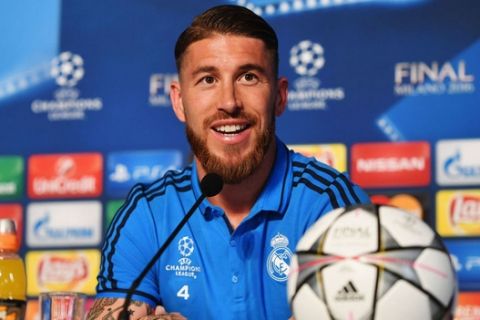 MILAN, ITALY - MAY 27:  In this handout image provided by UEFA Sergio Ramos of Real Madrid talks to the media during a Real Madrid press conference on the eve of the UEFA Champions League Final against Atletico de Madrid at Stadio Giuseppe Meazza on May 27, 2016 in Milan, Italy.  (Photo by Handout/UEFA via Getty Images)