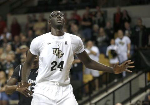 Central Florida center Tacko Fall (24) waits for a pass during the first half of an NCAA college basketball game against Cincinnati in Orlando, Fla., on Sunday, Feb. 26, 2017. (AP Photo/Reinhold Matay)