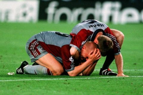 Bayern Munich's Carsten Jancker and Thomas Helmer both shed tears after their team were beaten in the last minute by Manchester United.
