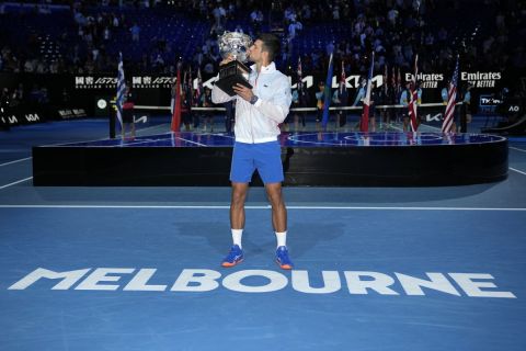 Novak Djokovic of Serbia kisses the Norman Brookes Challenge Cup after defeating Stefanos Tsitsipas of Greece in the men's singles final at the Australian Open tennis championship in Melbourne, Australia, Sunday, Jan. 29, 2023. (AP Photo/Aaron Favila)(AP Photo/Aaron Favila)