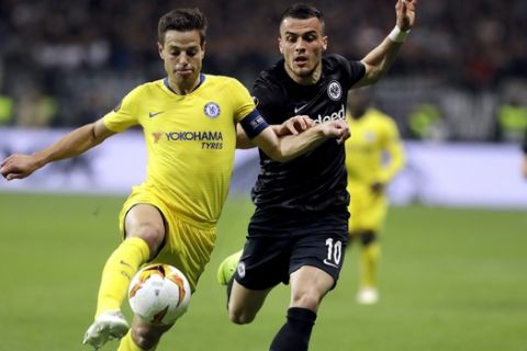Chelsea's Cesar Azpilicueta, left, and Frankfurt's Filip Kostic, right, challenge for the ball during a Uefa Europa League, first leg semifinal soccer match between Eintracht Frankfurt and FC Chelsea in the Commerzbank Arena in Frankfurt, Germany, Thursday, May 2, 2019. (AP Photo/Michael Probst)