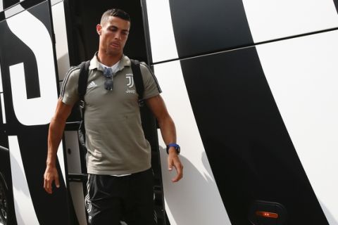 Cristiano Ronaldo arrives at Villar Perosa, northern Italy, Sunday, Aug.12, 2018, to take part in a friendly match between the Juventus A and B teams. (AP Photo/Antonio Calanni)