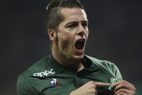 Saint-Etienne's Romain Hamouma celebrates after he scored a goal against Lyon during their French League One soccer match in Saint-Etienne, central France, Sunday, Jan. 20, 2019. (AP Photo/Laurent Cipriani)