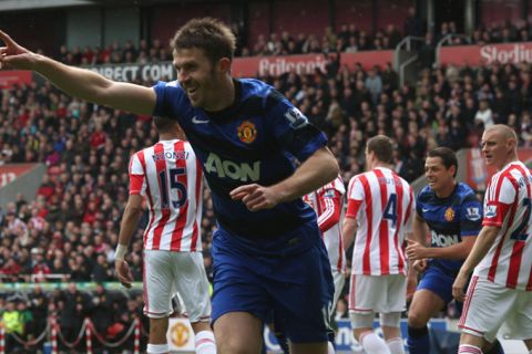 STOKE ON TRENT, ENGLAND - APRIL 14:  Michael Carrick of Manchester United celebrates scoring their first goal during the Barclays Premier League match between Stoke City and Manchester United at Britannia Stadium on April 14, 2013 in Stoke on Trent, England.  (Photo by John Peters/Man Utd via Getty Images)