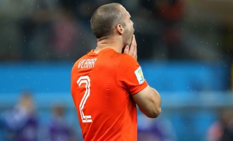 SAO PAULO, BRAZIL - JULY 09: Ron Vlaar of the Netherlands reacts after having his penalty shot saved in a shootout during the 2014 FIFA World Cup Brazil Semi Final match between the Netherlands and Argentina at Arena de Sao Paulo on July 9, 2014 in Sao Paulo, Brazil.  (Photo by Clive Rose/Getty Images)