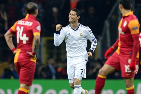 Real Madrid's Portuguese forward Cristiano Ronaldo celebrates after scoring the first goal of his team during the UEFA Champions League quarter-final second leg football match Galatasaray vs Real Madrid on April 9, 2013 at Ali Sami Yen stadium in Istanbul.  AFP PHOTO / JAVIER SORIANO        (Photo credit should read JAVIER SORIANO/AFP/Getty Images)