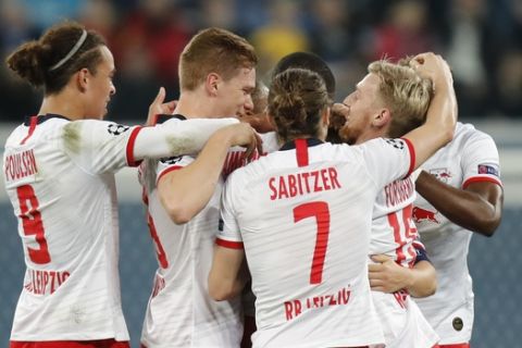 Leipzig players celebrate after Leipzig's Diego Demme scored his side's opening goal during the Champions League group G soccer match between Zenit St. Petersburg and RB Leipzig at the Saint Petersburg stadium in St.Petersburg, Russia, Tuesday, Nov. 5, 2019. (AP Photo/Dmitri Lovetsky)