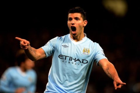 MANCHESTER, ENGLAND - APRIL 11:   Sergio Aguero of Manchester City celebrates scoring his team's second goal during the Barclays Premier League match between Manchester City and West Bromwich Albion at the Etihad Stadium on April 11, 2012 in Manchester, England. (Photo by Laurence Griffiths/Getty Images)