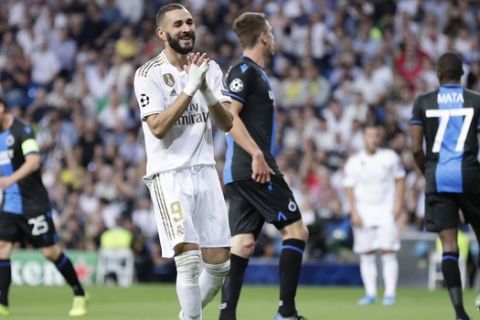 Real Madrid's Karim Benzema reacts during the Champions League group A soccer match between Real Madrid and Club Brugge, at the Santiago Bernabeu stadium in Madrid, Tuesday, Oct.1, 2019. (AP Photo/Manu Fernandez)