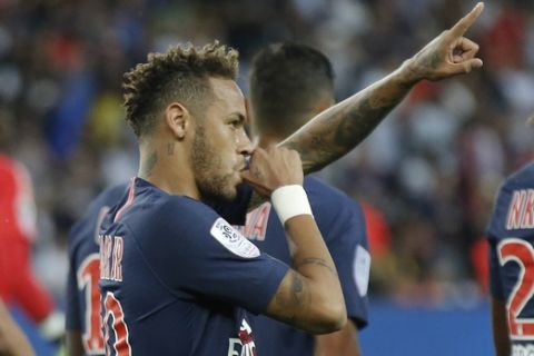 PSG's Neymar celebrates the opening goal during their League One soccer match between Paris Saint-Germain and Caen at Parc des Princes stadium in Paris, Sunday, Aug. 12, 2018. (AP Photo/Michel Euler)