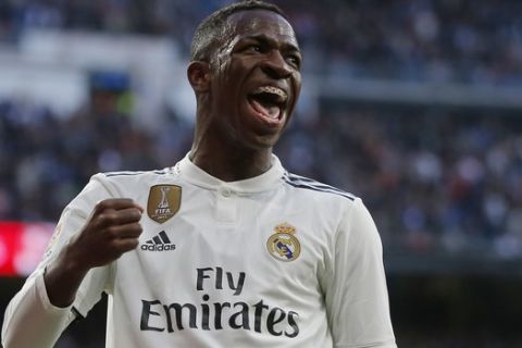 Real Madrid's Vinicius Junior celebrates after scoring his side's1st goal during a Spanish La Liga soccer match between Real Madrid and Valladolid at the Santiago Bernabeu stadium in Madrid, Spain, Saturday, Nov. 3, 2018. (AP Photo/Paul White)