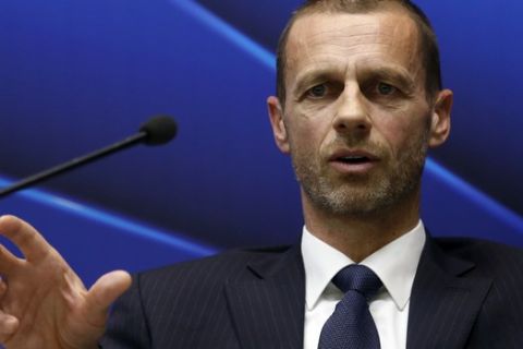UEFA president Aleksander Ceferin speaks during a news conference in Stara Pazova, near Belgrade, Serbia, Friday, March 31, 2017. FIFA wants to hold a new six-team playoff round in the 2026 World Cup host country to complete the expanded 48-team tournament lineup. Europe would be "fairly represented" by the quotas, said Ceferin. (AP Photo/Darko Vojinovic)