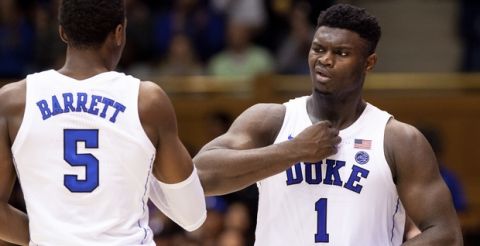 Duke's Zion Williamson (1) and Duke's RJ Barrett (5) thump their chests late in the second half of an NCAA college basketball game against Hartford in Durham, N.C., Wednesday, Dec. 5, 2018. (AP Photo/Ben McKeown)