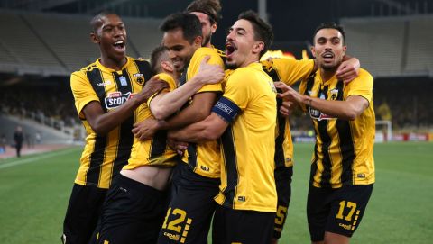AEK Athens' Rodrigo Galo, center, jubilates with teammates after scoring his sides first goal during a Champions League third qualifying round, second leg, soccer match between AEK Athens and Celtic at the Olympic stadium in Athens, Tuesday, Aug. 14, 2018. (AP Photo/Petros Giannakouris)